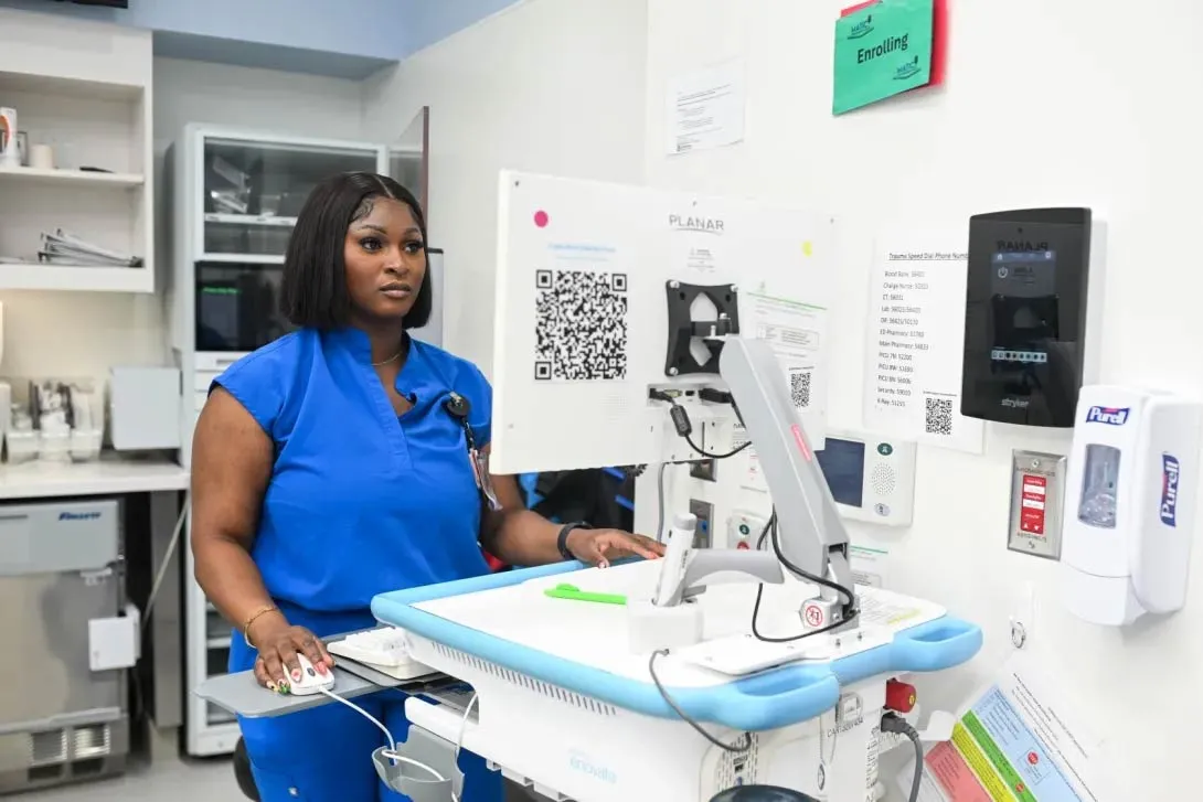 Pediatric healthcare professional reviewing electronic health record information at Children’s Healthcare of Atlanta Arthur M. Blank Hospital. (Photo courtesy of Children's Healthcare of Atlanta)